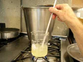 Stirring the contents inside the beaker